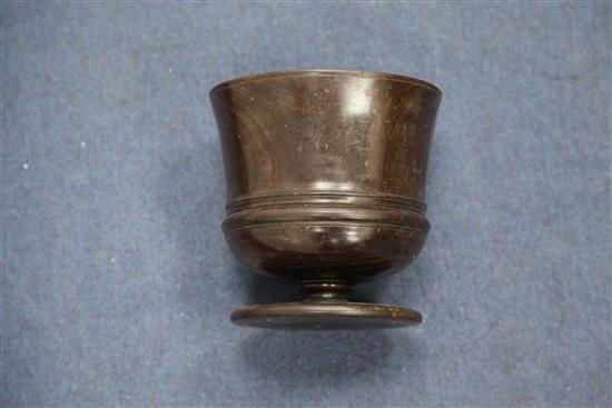 A late 17th century lignum vitae wassail cup, 7.25in., repaired